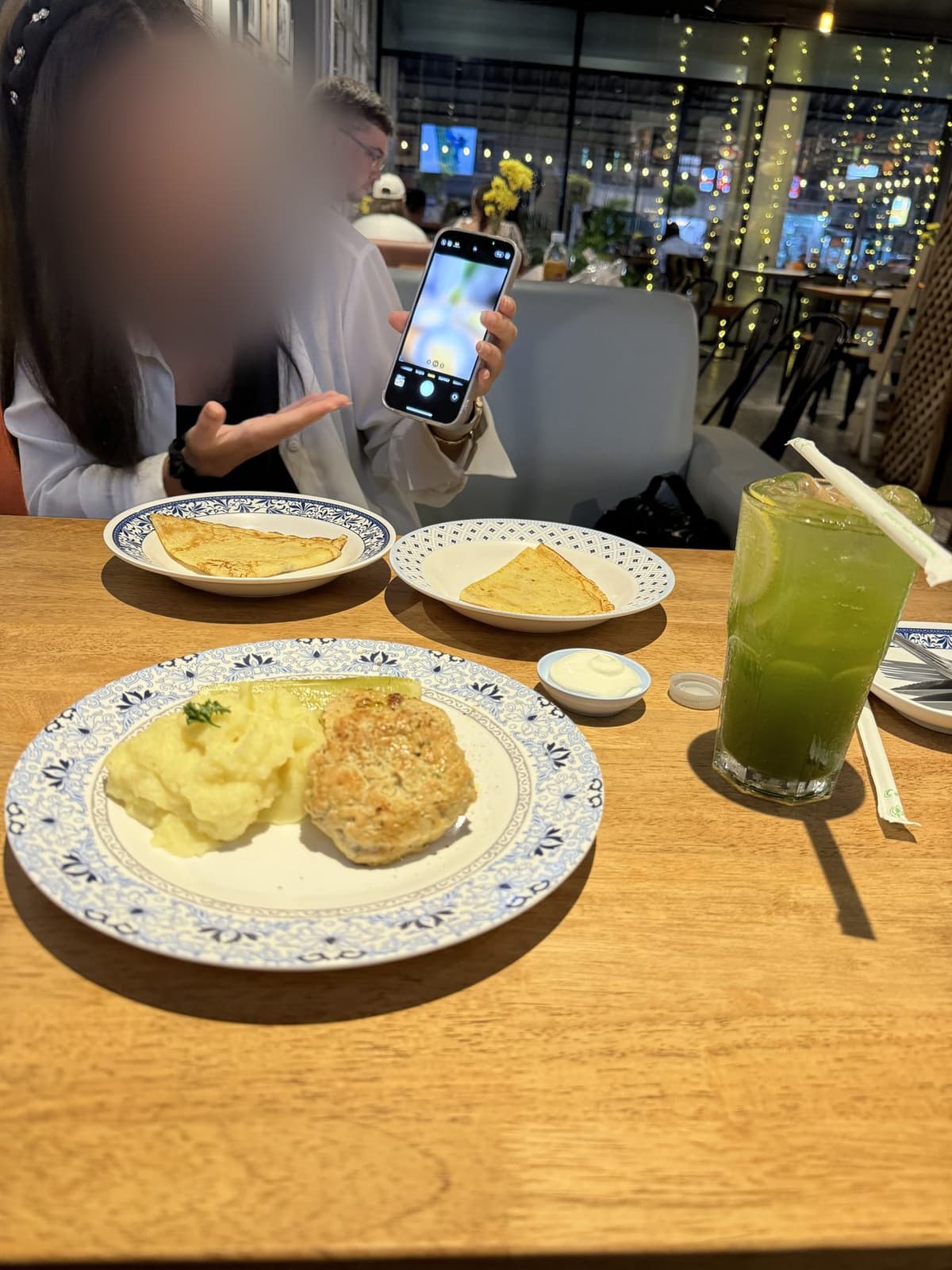 A dinner date, plates of food on the table
